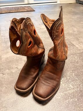 Ariat Tan Leather Boots with Orange Accents worn by Chris on Ghost Asylum